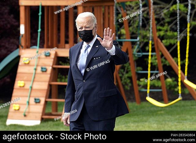 United States President Joe Biden waves to the media on the South Lawn of the White House in Washington before his departure to Portland, Oregon on April 21