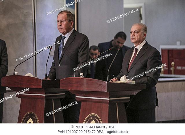 07 October 2019, Iraq, Baghdad: Russian Foreign Minister Sergey Lavrov (L) and Iraqi counterpart Mohamed Ali Alhakim attend a joint press conference after their...