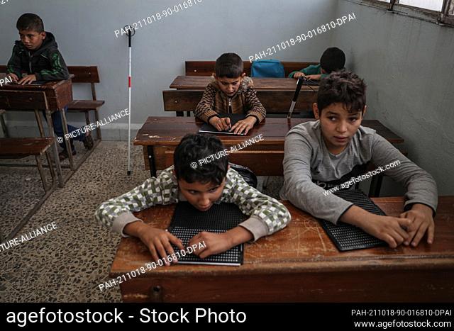 18 October 2021, Syria, Idlib City: Blind students attend a class at the Sighted Hearts School for the blind in Idlib City