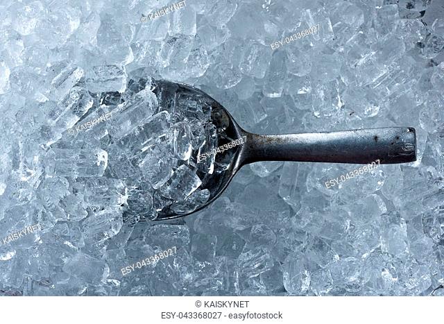 Background of ice tube and Ice scoop made from metal