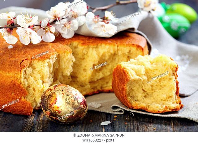Flowering branch of apricot and Italian Easter bread