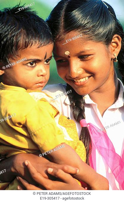 Girl and baby in Kerala, India, Stock Photo, Picture And Rights Managed  Image. Pic. E19-305417 | agefotostock