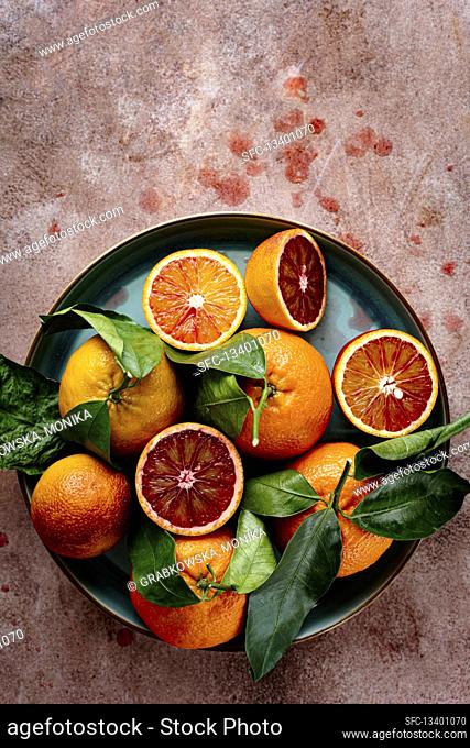 Plate with blood oranges and clementines