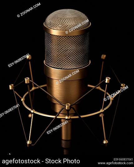 Vintage brass microphone isolated on black background. 3D illustration