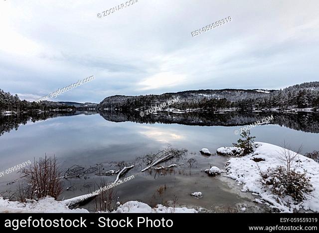 Winter landscape, the Nomelandsdammen, a lake made by a dam for making electricity in the river Otra. Norway