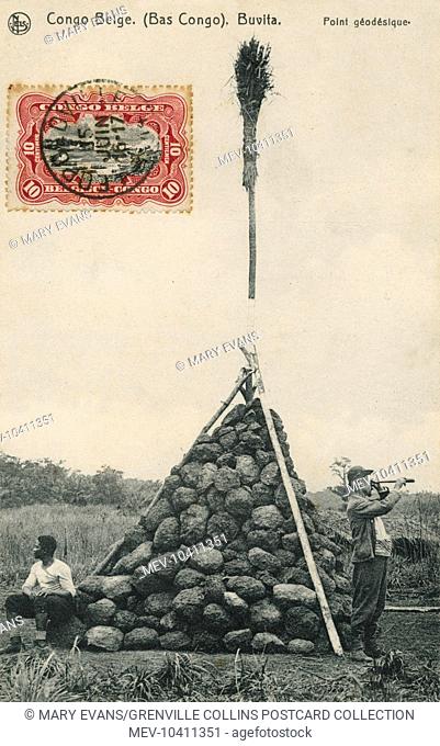 A Trigonometry Point at Buvita in the Belgium Congo, topped off with a broom!