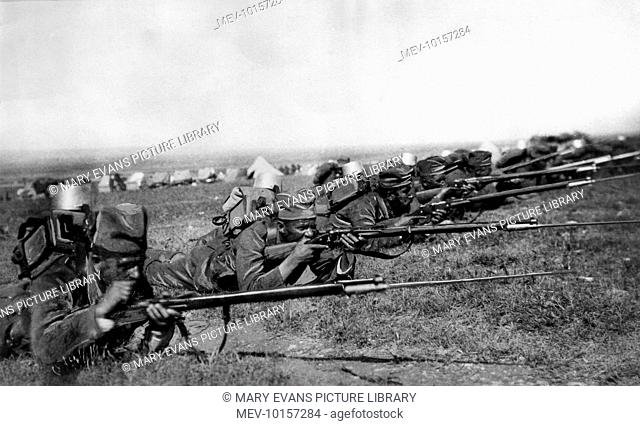 Soldiers of the Serbian army, on military manoevers, having just been re-equipped with uniforms and bayonettes, etc