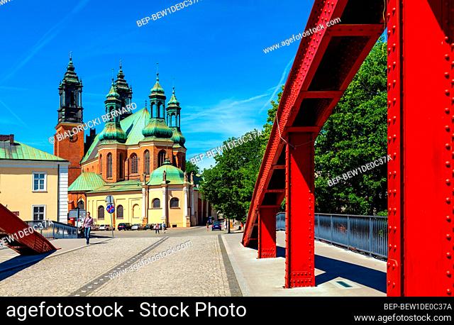 Poznan, Poland - June 5, 2015: Panoramic view of Ostrow Tumski island with Jordan Bridge over Cybina river and Poznan Cathedral of St. Peter and St