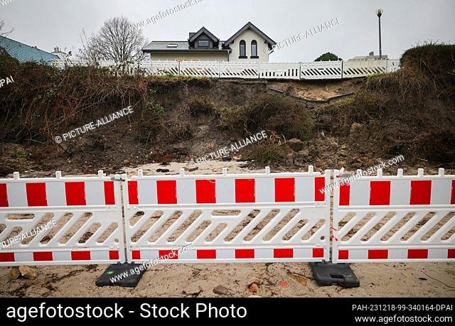PRODUCTION - 18 December 2023, Schleswig-Holstein, Schilksee: Damage after the Baltic Sea flood can be seen on the coast in Schilksee near Kiel
