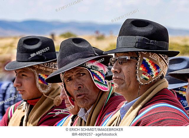 Indigenous men in typical clothing with typical hat, Tihuanaku, Tiawanacu, Tiahuanaco, UNESCO World Heritage, Ingavi Province, La Paz, Bolivia