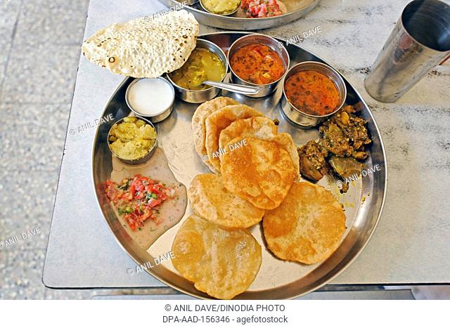Maharashtrian vegetarian thali ; taluka Junnar ; district Pune ; Maharashtra ; India