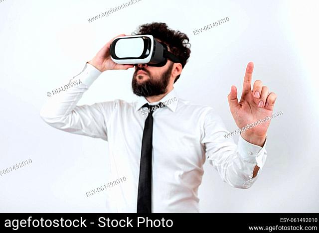 Man Wearing Vr Glasses And Pointing On Important Messages With One Finger