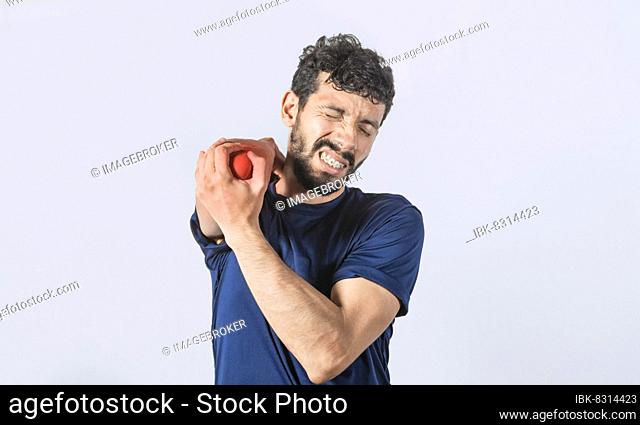 Man with elbow cramp, Person with elbow pain isolated, concept of a man with rheumatism elbow pain, man massaging sore elbow