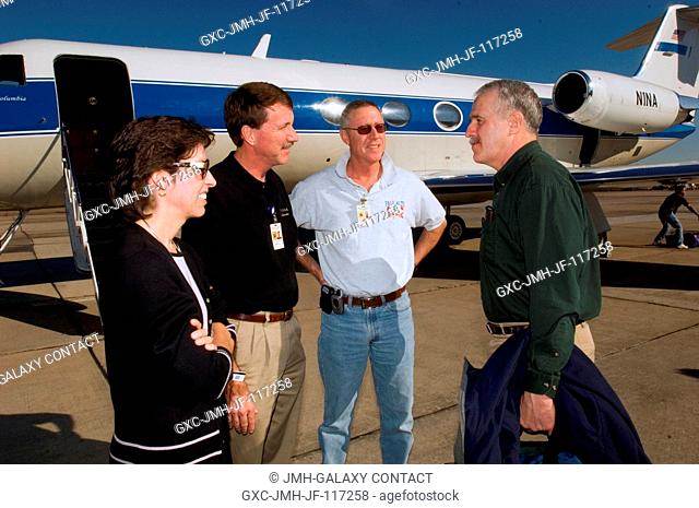 Ellen Ochoa (left), Deputy Director, Fight Crew Operations Directorate, Johnson Space Center (JSC); Kent V. Rominger, Chief, Astronaut Office; and Michael A