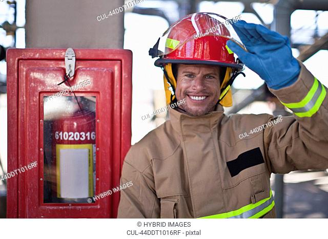 Firefighter smiling on site