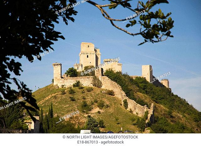 Italy, Umbria, Assisi.  The castle, Rocca Maggiore, dominates the hilltop above the town of Assisi.  Home of St Francis of Assisi