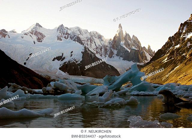 Cerro Torre, icebergs at the Laguna Torre, backlight (evening), Chile, Patagonia, Los Glaciares National Park, El Chalten