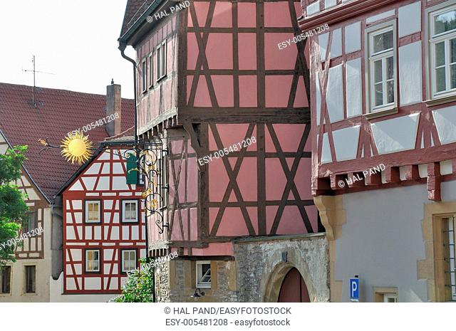 sign and wattle, bad wimpfen, sun sign and sunny facades of old wattle houses in city center