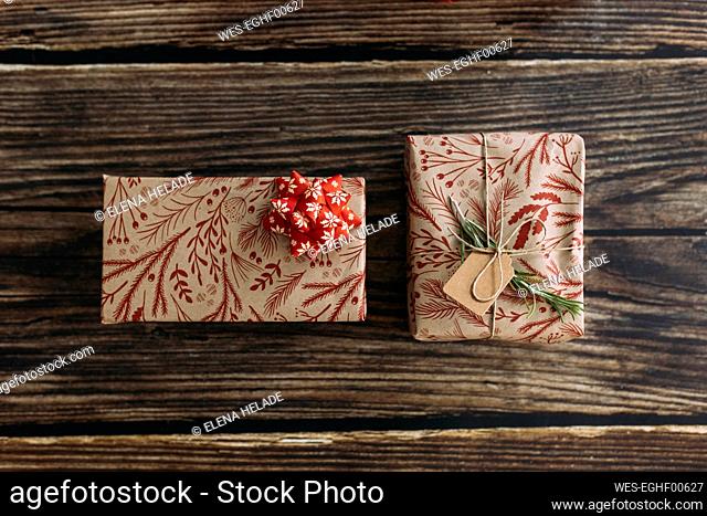 Christmas presents on wooden table