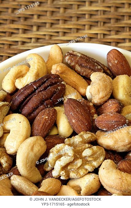 A bowl of mixed nuts: Cashews, almonds, pecans and walnuts