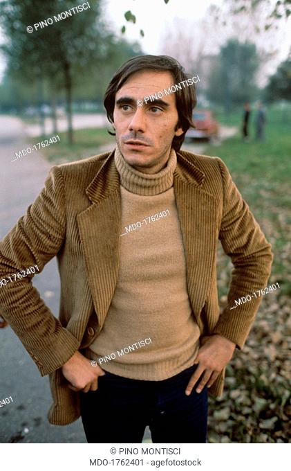 Portrait of Roberto Vecchioni. Portrait of Italian singer-songwriter and writer Roberto Vecchioni with his hands on his hip. 1977