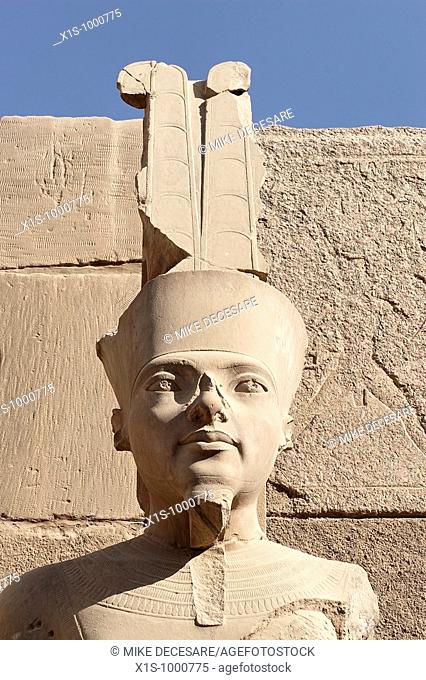 An ancient stone bust of an Egyptian Pharoah