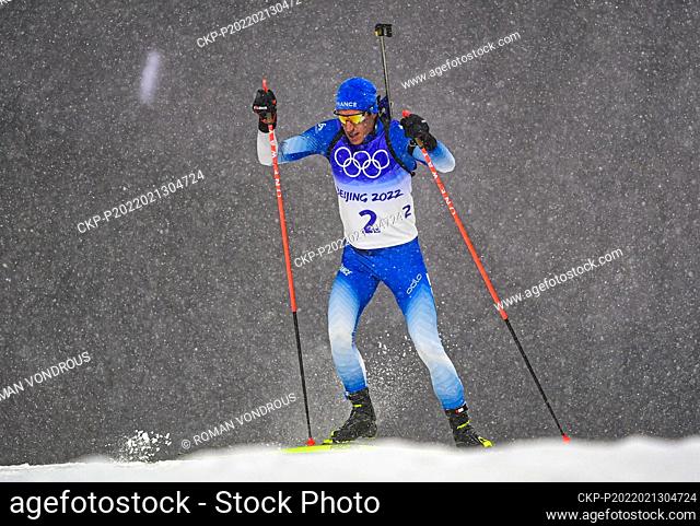 Quentin Fillon Maillet of France competes during the men's 12, 5-kilometer biathlon sprint competition at the 2022 Winter Olympics in Zhangjiakou, China