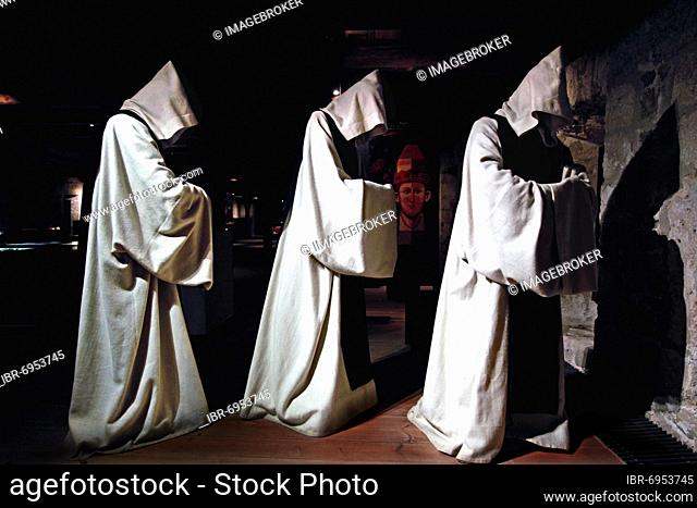 Walkenried Monastery, Cistercian Abbey, medieval monastery complex, three figures, mannequins with Cistercian cowls, hood, museum, column path