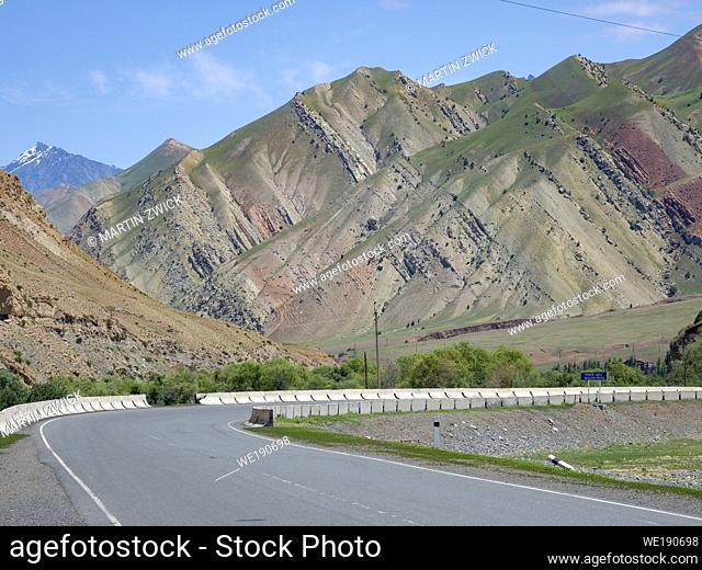 Landscape along the Pamir Highway. The mountain range Tian Shan or Heavenly Mountains. Asia, Central Asia, Kyrgyzstan