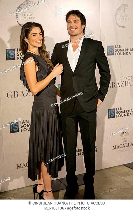 Nikki Reed and Ian Somerhalder pose for photos at the first Ian Somerhalder Foundation Event in Chicago, IL on December 3, 2016