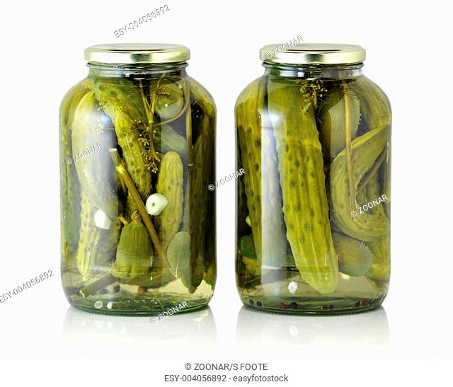 Glass jars with pickled cucumbers