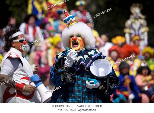 A clown uses a megaphone during the 16th International Clown Convention: The Laughter Fair organized by the Latino Clown Brotherhood, in Mexico City, October 17