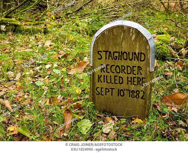 Staghound Recorder Killed Here sign at Horner Wood in Exmoor National Park, Somerset, England