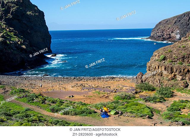 bay and cliffs at puerto el juncal, gran canaria, spain