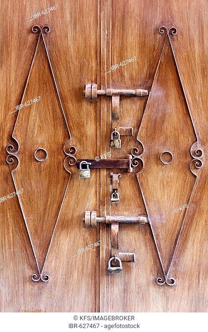 Shop door with five padlocks, Medina, Marrakech, Morocco, Africa