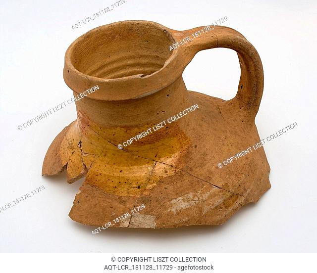 Neck of pottery jug from Andenne, yellow shard, lead glaze on the shoulder, kitchen utensils fragment soil found ceramic earthenware glaze lead glaze