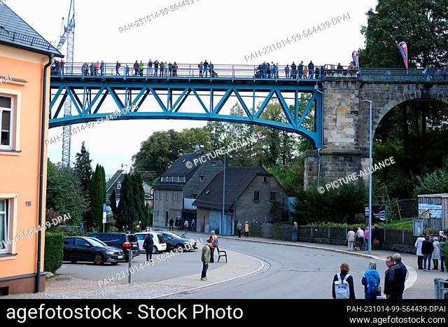14 October 2023, Saxony, Chemnitz: The reopened railroad viaduct Rabenstein. The structure was converted into a footbridge in 1984