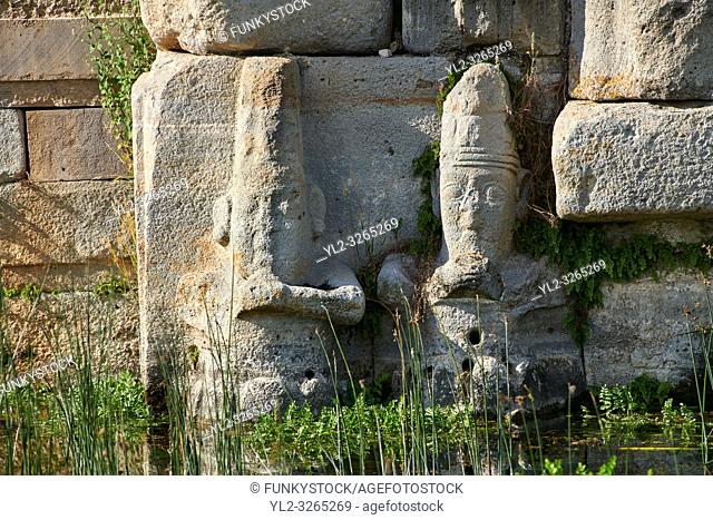 Close up of lower relief sculptures of Hittite gods at Eflatun P?nar ( Eflatunp?nar) Ancient Hittite relief sculpture monument and sacred pool