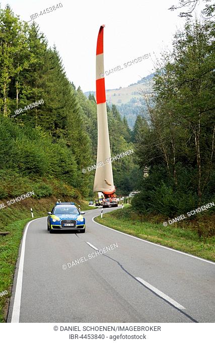 Heavy transport, wind turbine blade on heavy goods vehicle, curvy road in Schönau, Black Forest, Baden-Württemberg, Germany