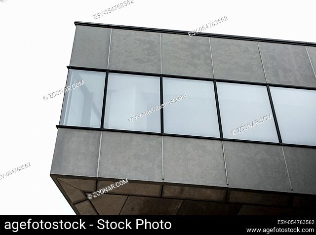 fragment of concrete structure with empty windows