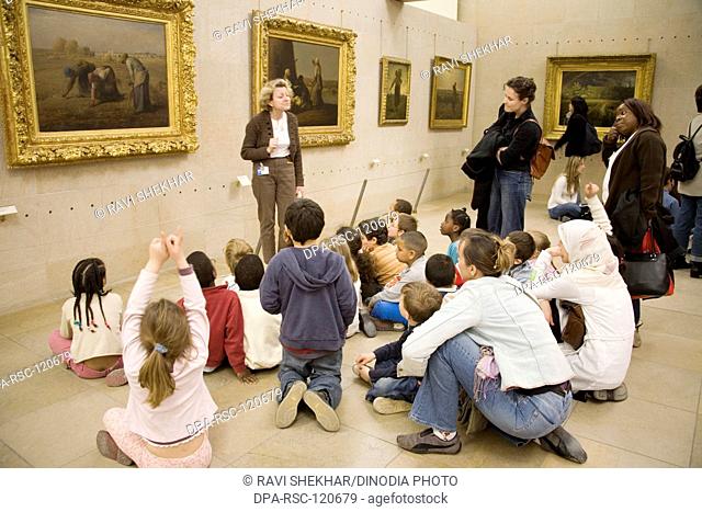 Students learning about art in The Musee d'Orsay Art Museum ; Paris ; France ; Europe