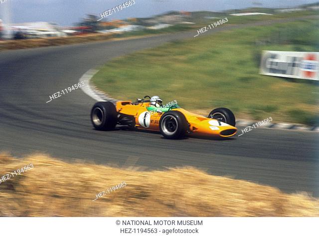 Denny Hulme, Dutch Grand Prix, Zandvoort, 1968. Hulme steers his McLaren through a corner. He retired from the race after 10 laps with ignition trouble