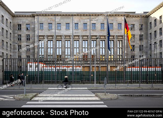 22 November 2023, Berlin: Pedestrians and a cyclist in front of the Ministry of Finance. The Ministry of Finance had blocked the commitment appropriations from...