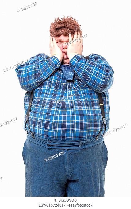 Overweight obese country yokel squashing his face, on white background