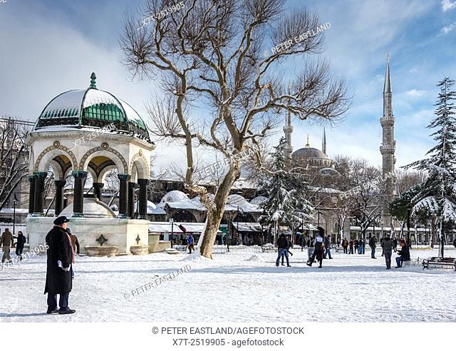 A winters afternoon in the Hippodrome, with the Kaiser Wilhelm II fountain and the Sultan Ahmet or Blue mosque in the background