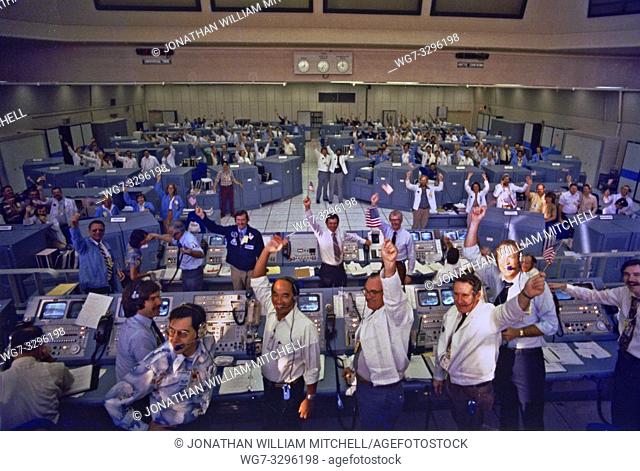USA KENNEDY SPACE CENTER, FLA. - The STS-1 Space Shuttle Team celebrates a successful liftoff of Columbia form Launch Pad 39A a few seconds past 7 a