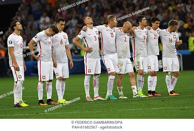 Players of Poland react during the penalty shootout of the UEFA EURO 2016 quarter final soccer match between Poland and Portugal at the Stade Velodrome in...