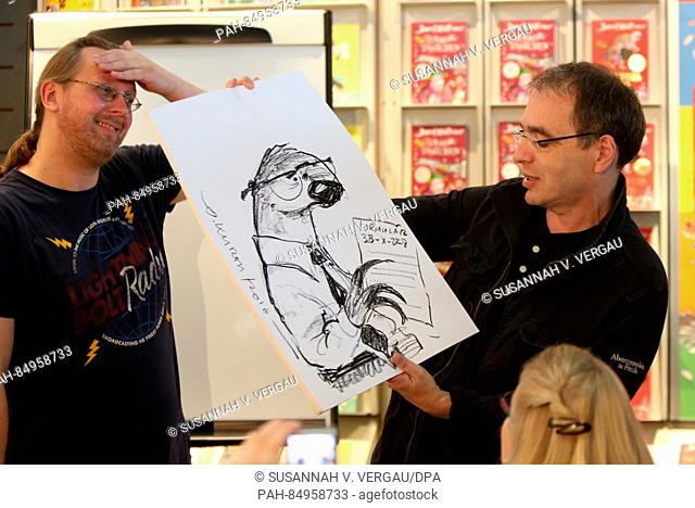 Comic artist Oliver Kurth and author David Safier at the Frankfurt Book Fair in Frankfurt/Main, Germany, 20 October 2016. PHOTO: SUSANNAH V