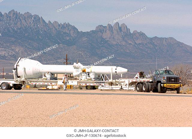 The launch abort system for the Pad Abort-1 (PA-1) flight test is rolled out to the launch pad in preparation for the test at the U.S