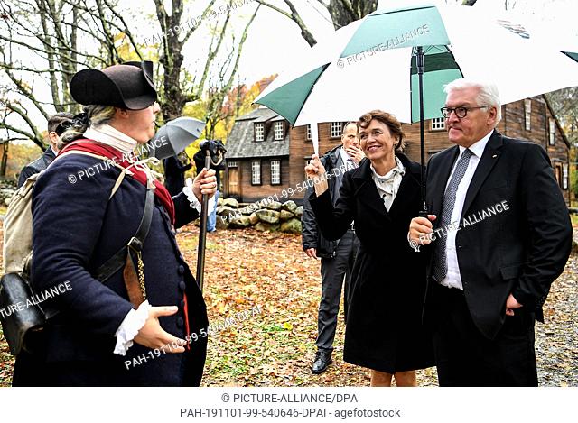 31 October 2019, US, Boston: Federal President Frank-Walter Steinmeier and his wife Elke Büdenbender are accompanied on a walk through the Minute Man National...